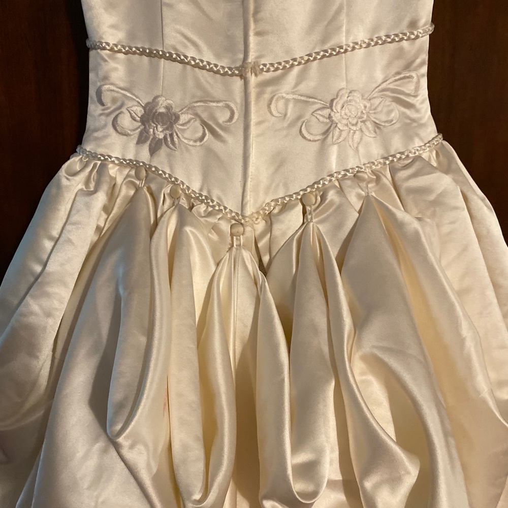 Bridal by Demetrios wedding gown. Built in Bustle. 
Size 2-4. 
$400
